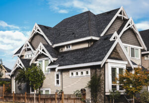 GAF Landmark shingles on a home with beige siding.